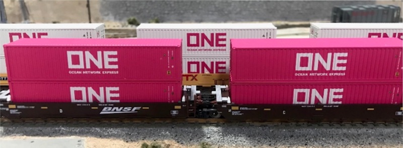 One on BNSF and TTX Well Cars